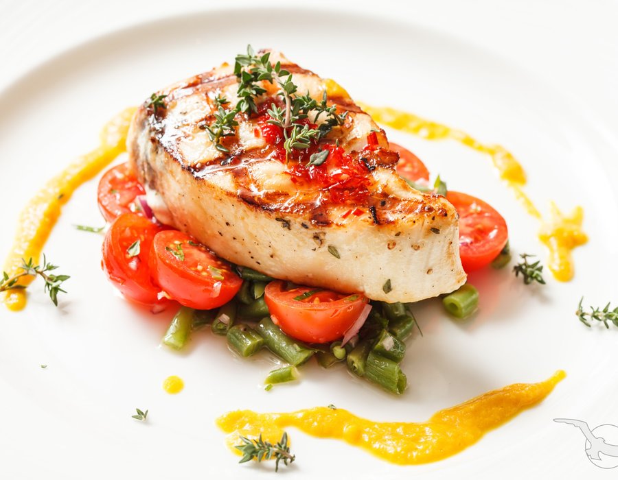 Wolfsbarschfilet auf Gemüse